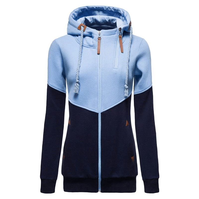 Stylish two-tone zip hoodie in light and dark blue, with hood and patchwork design, offering warmth and sporty chic appeal.